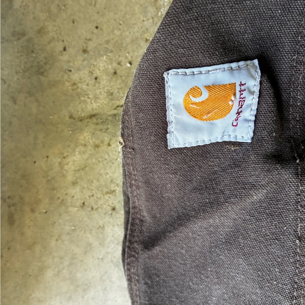 Carhartt Dark Brown Canvas Workwear Piece with Orange Logo Patch
